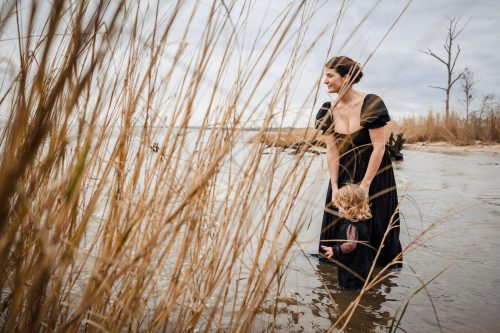 12-fontainebleaustatepark-familyphotos mother and daughter in black dresses in a lake
